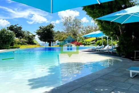 1-BR-Beach-Condo-For-Sale-at-Tambuli-Seaside-Living-Swimming-Pool-2