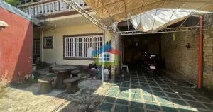 Spacious 7-bedroom house and lot for sale in Cebu City near Gaisano Capital Tisa, featuring a wide outdoor area, covered parking, and solid built structures that offer plenty of room for living and future upgrades.